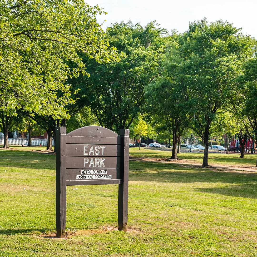 East Park entrance sign among lawns and shade trees in East Nashville.